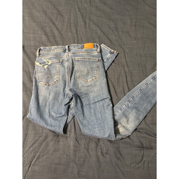 American Eagle Next Level Stretch Light Wash Distressed Skinny Jeans Size 0 - Picture 2 of 4